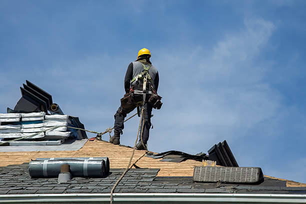 Professional Roofing technician working in Harvard, MA